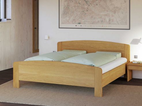 Bett „Kerstin“ aus Eiche in 180 x 200 cm, mit niedrigem runden Fußteil und ohne Gravur