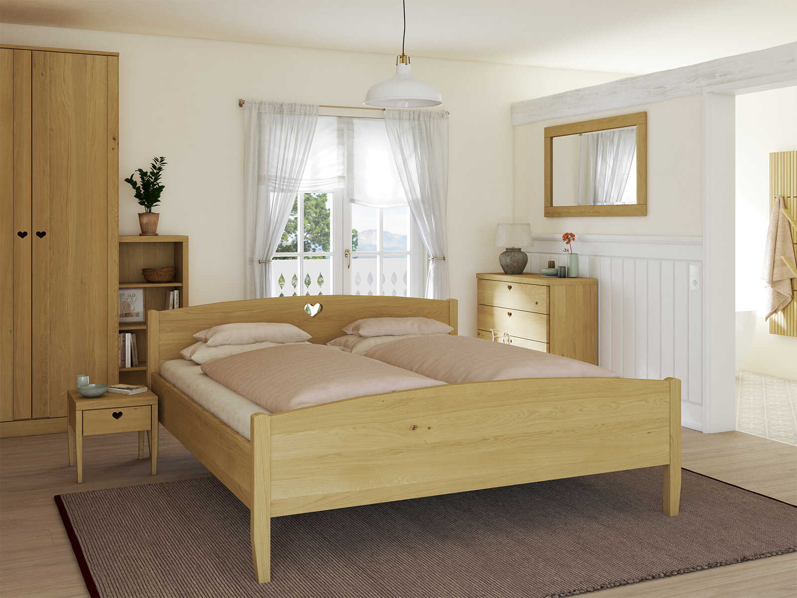 Schlafzimmer mit Eichenbett Hell „Heidi“ in 180 x 200 cm mit niedrigem runden Fußteil und mit Kopfteil „Herz“