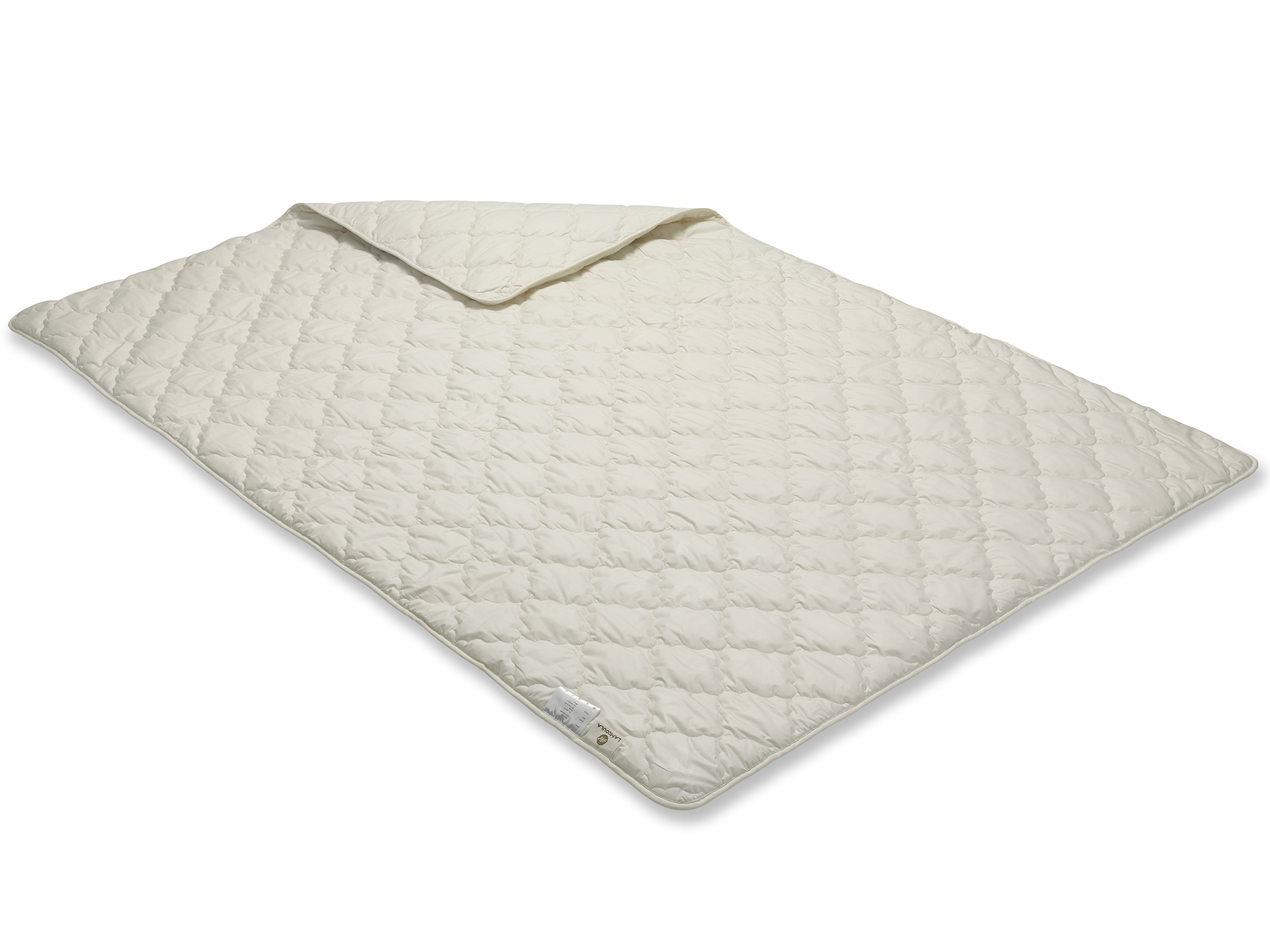 Diese Decke wird mit der Vielnadeltechnik hergestellt - so erhält sie ihr gleichmäßiges Muster. 