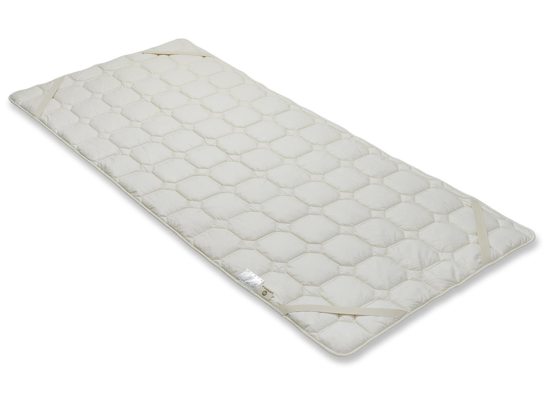 Mit vier Schräggummibändern kann das Unterbett an der Matratze befestigt werden. 